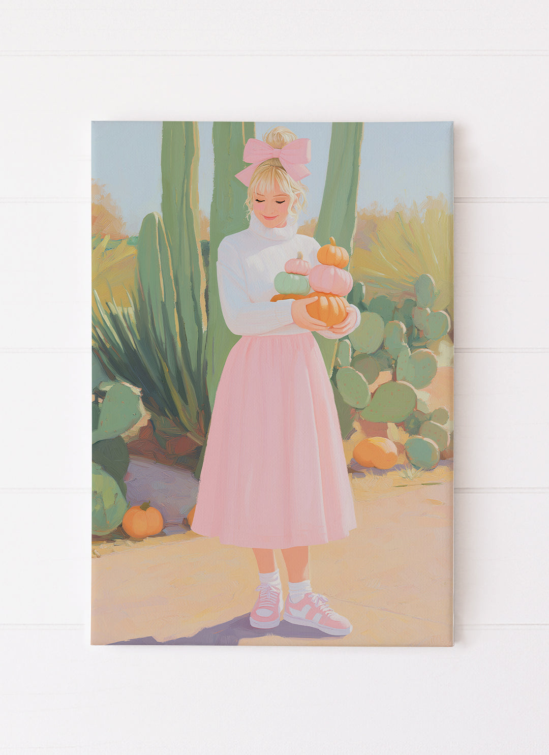 Girl in Pink Skirt Holding Pumpkins with Cactus Background